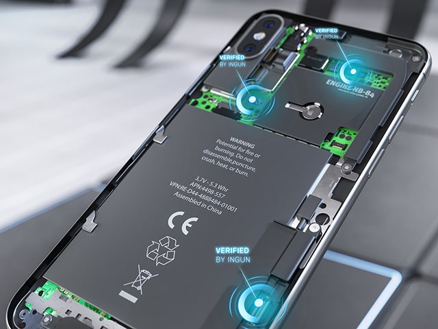 Rear view of the inner workings of a smartphone with visible internal test points